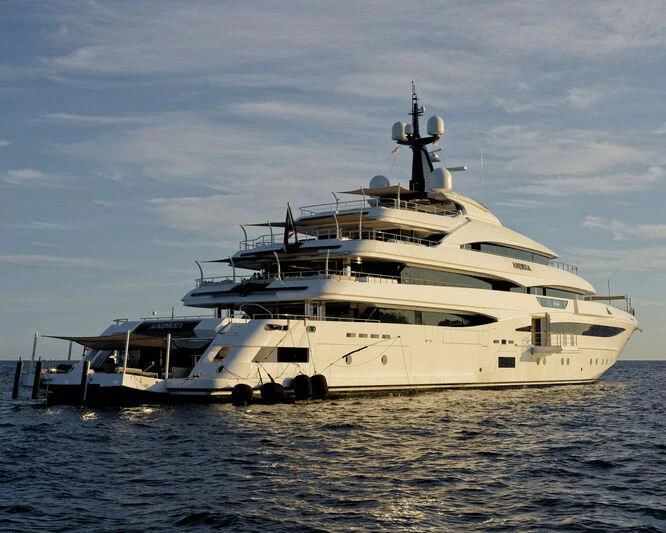 a white yacht in the water aboard STARBURST IV Yacht for Charter