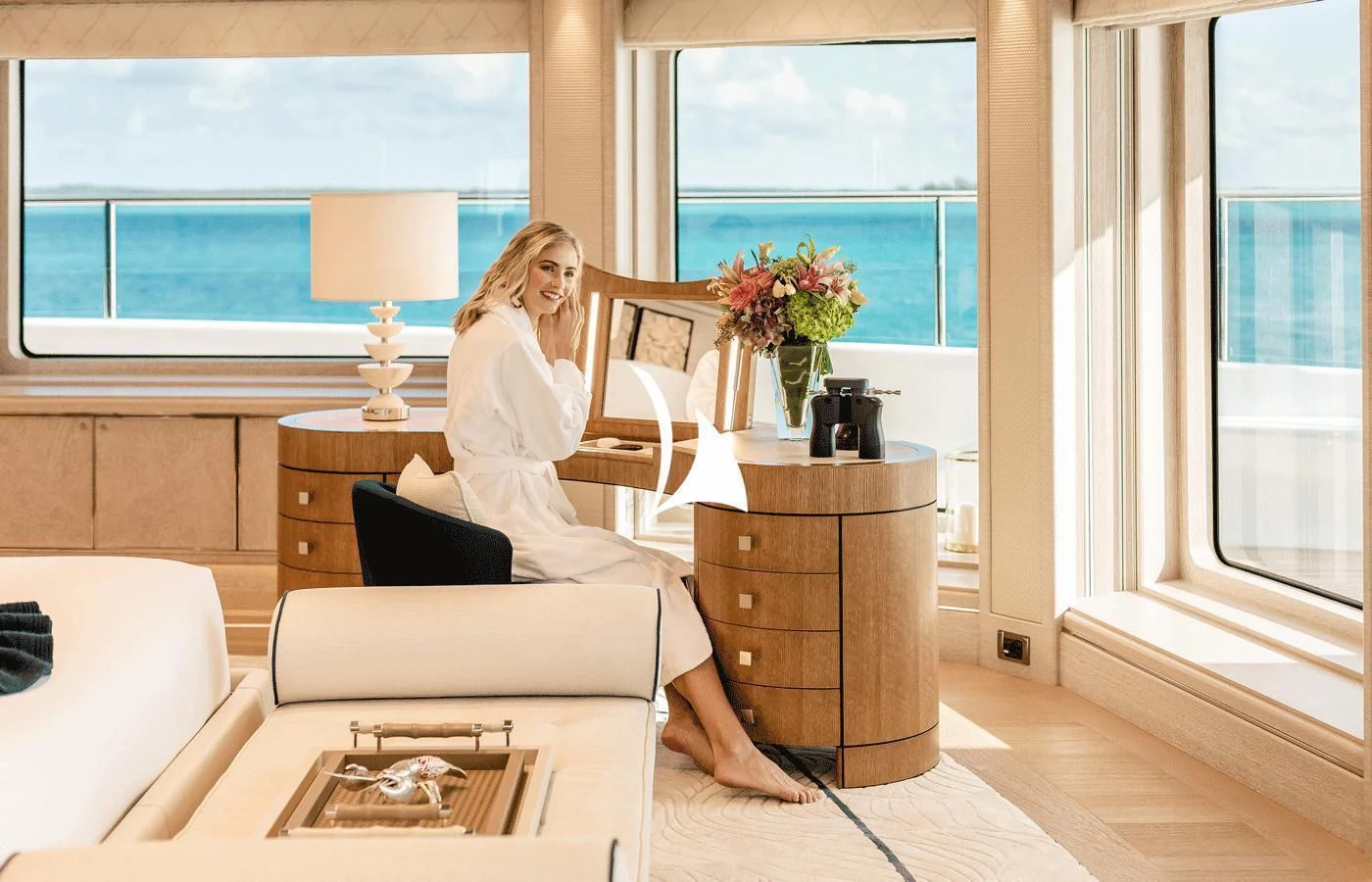 a person sitting on a couch aboard STARBURST IV Yacht for Charter