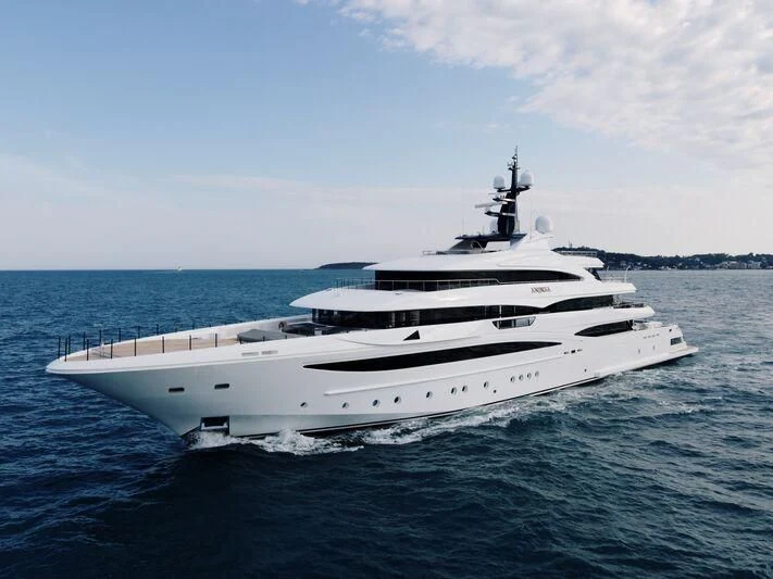 a white yacht on the water aboard STARBURST IV Yacht for Charter