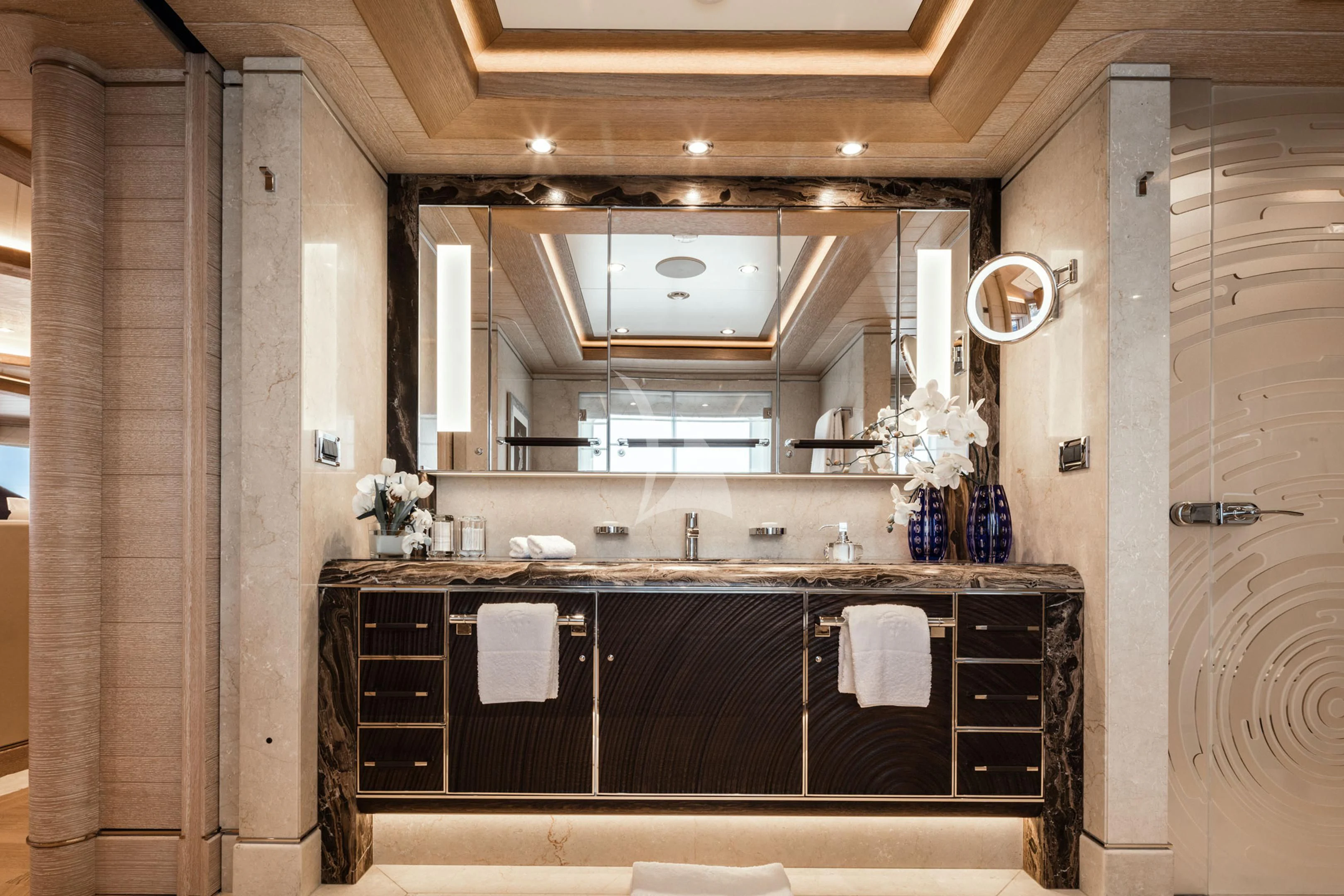 a kitchen with a sink and cabinets aboard STARBURST IV Yacht for Charter