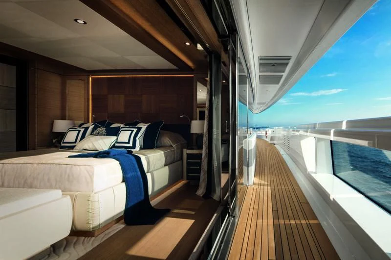 a room with a bed and a window aboard STARBURST IV Yacht for Charter