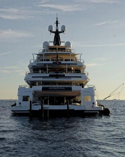 a large ship in the water aboard STARBURST IV Yacht for Charter