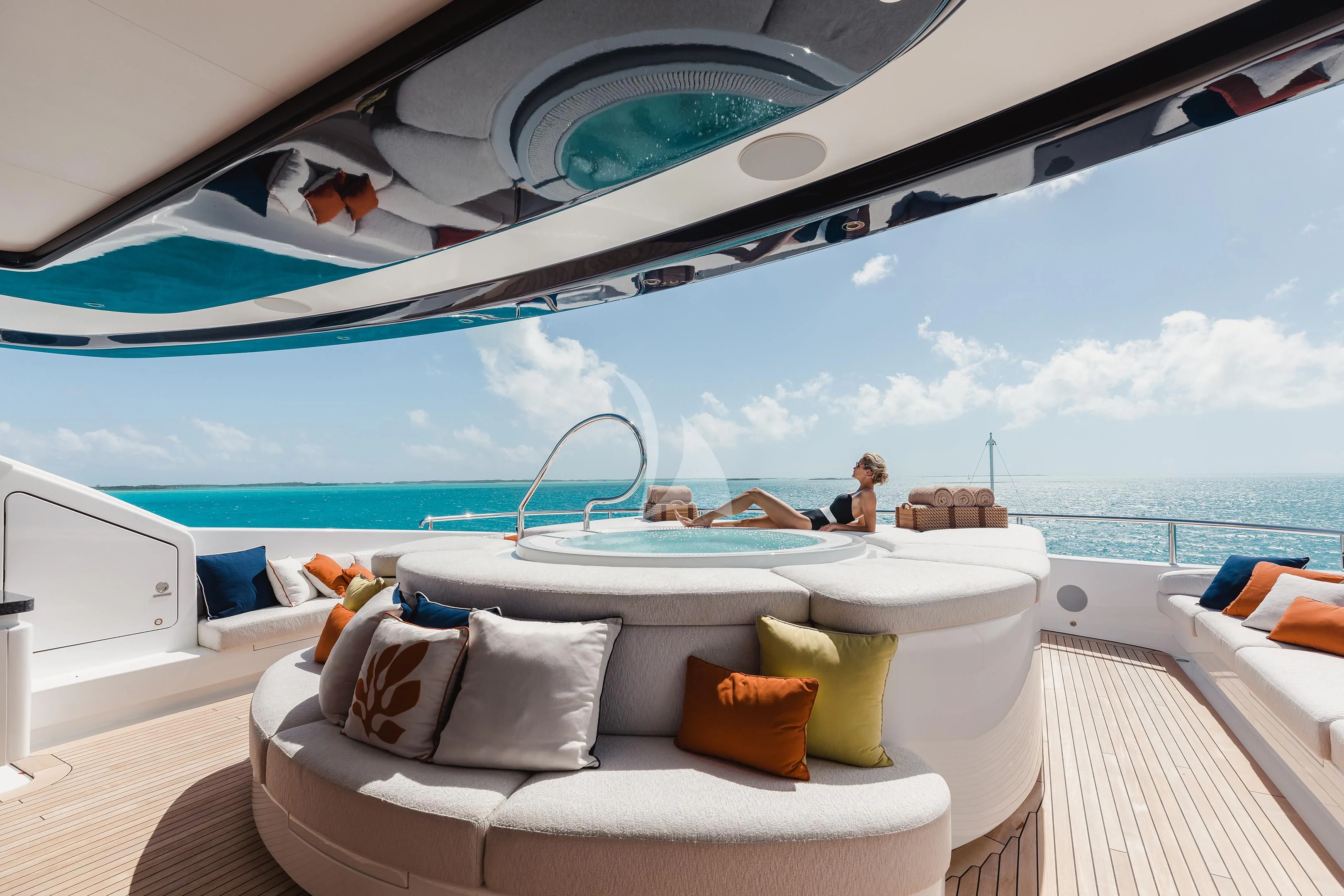 a white lounge chair on a boat aboard STARBURST IV Yacht for Charter