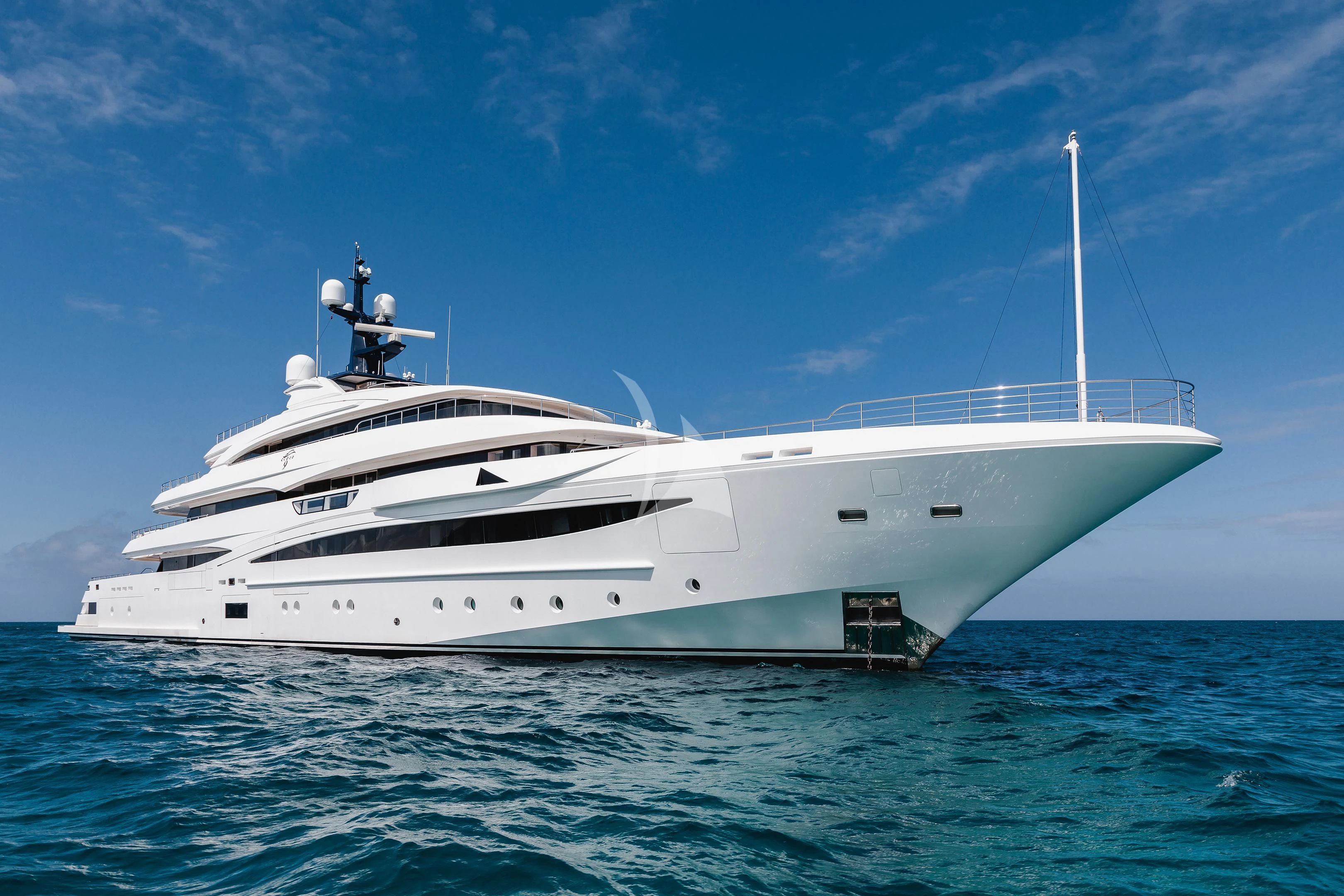 a white yacht in the water aboard STARBURST IV Yacht for Charter