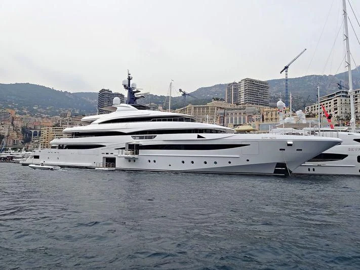 a large white yacht in the water aboard STARBURST IV Yacht for Charter