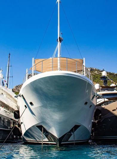 a large white boat docked aboard STARBURST IV Yacht for Charter