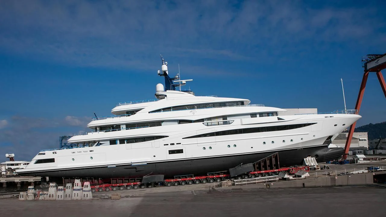 a large cruise ship docked aboard STARBURST IV Yacht for Charter