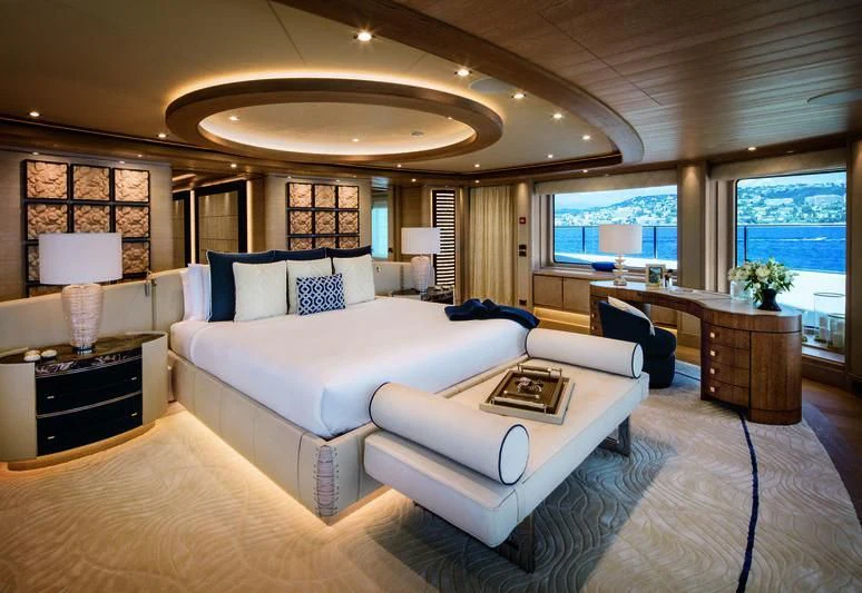 a large living room with a large window aboard STARBURST IV Yacht for Charter
