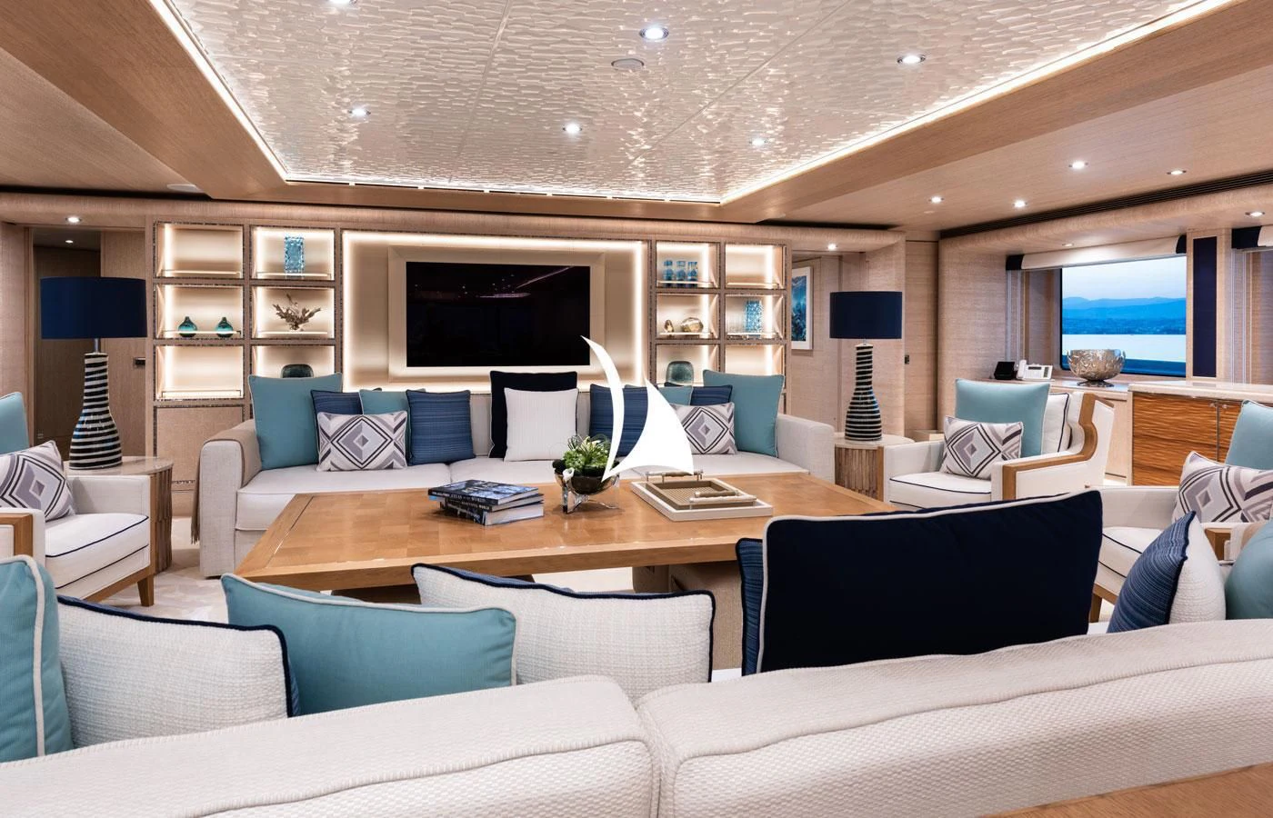 a room with a couch and a table aboard STARBURST IV Yacht for Charter