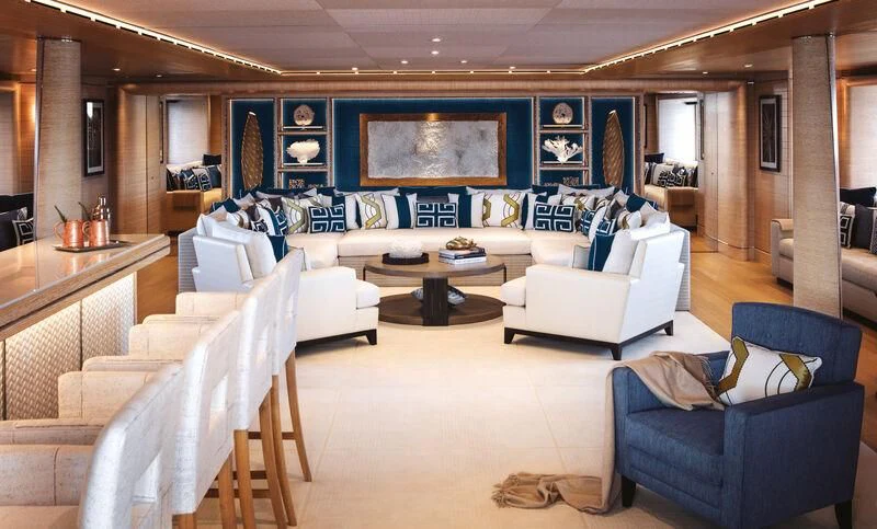 a living room with a large screen aboard STARBURST IV Yacht for Charter