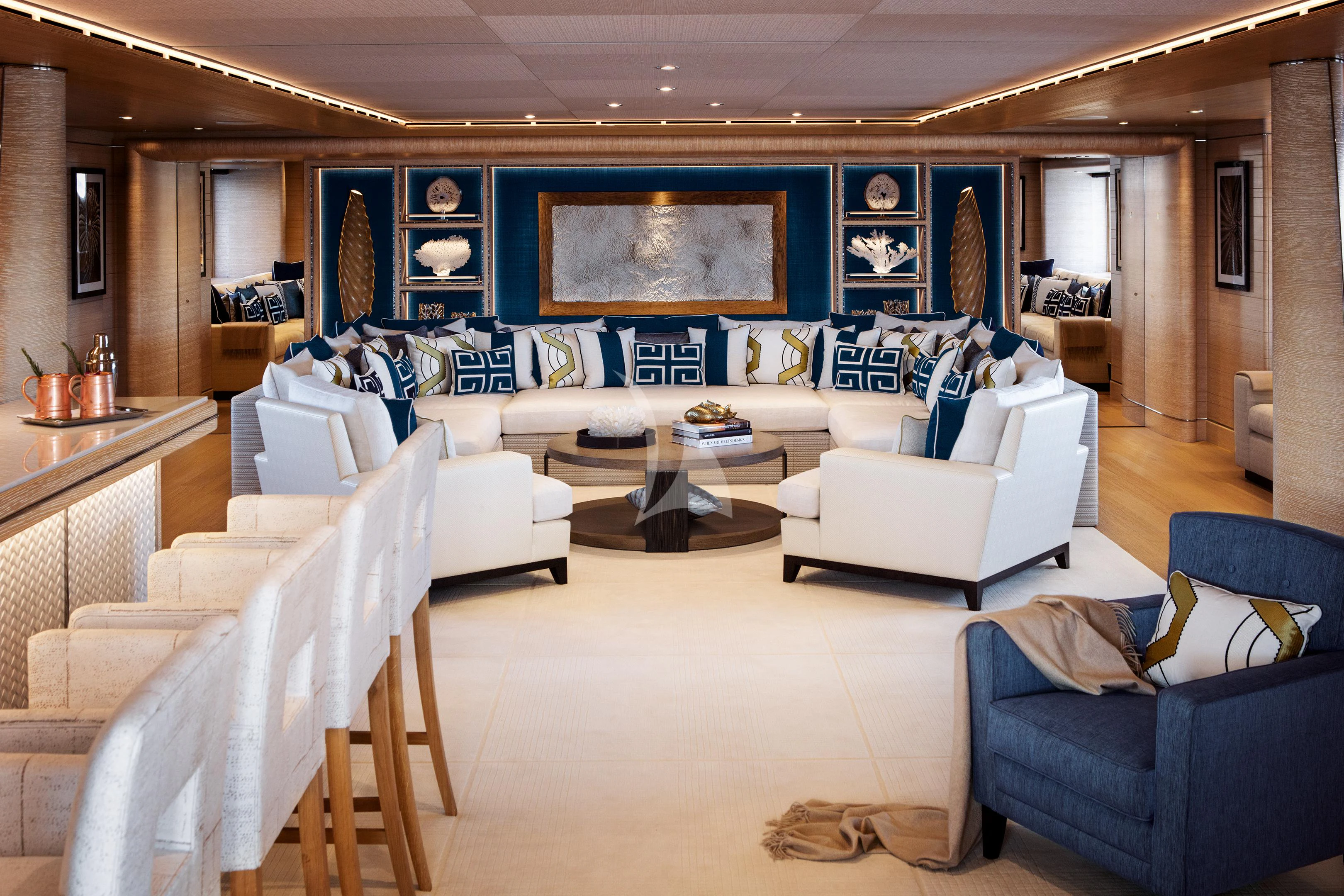 a living room with a large screen aboard STARBURST IV Yacht for Charter