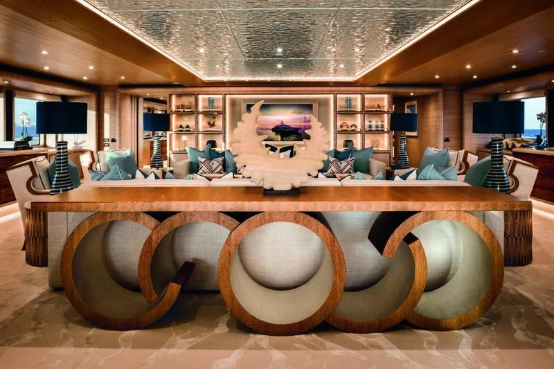 a wooden table with a large round wooden object on it aboard STARBURST IV Yacht for Charter