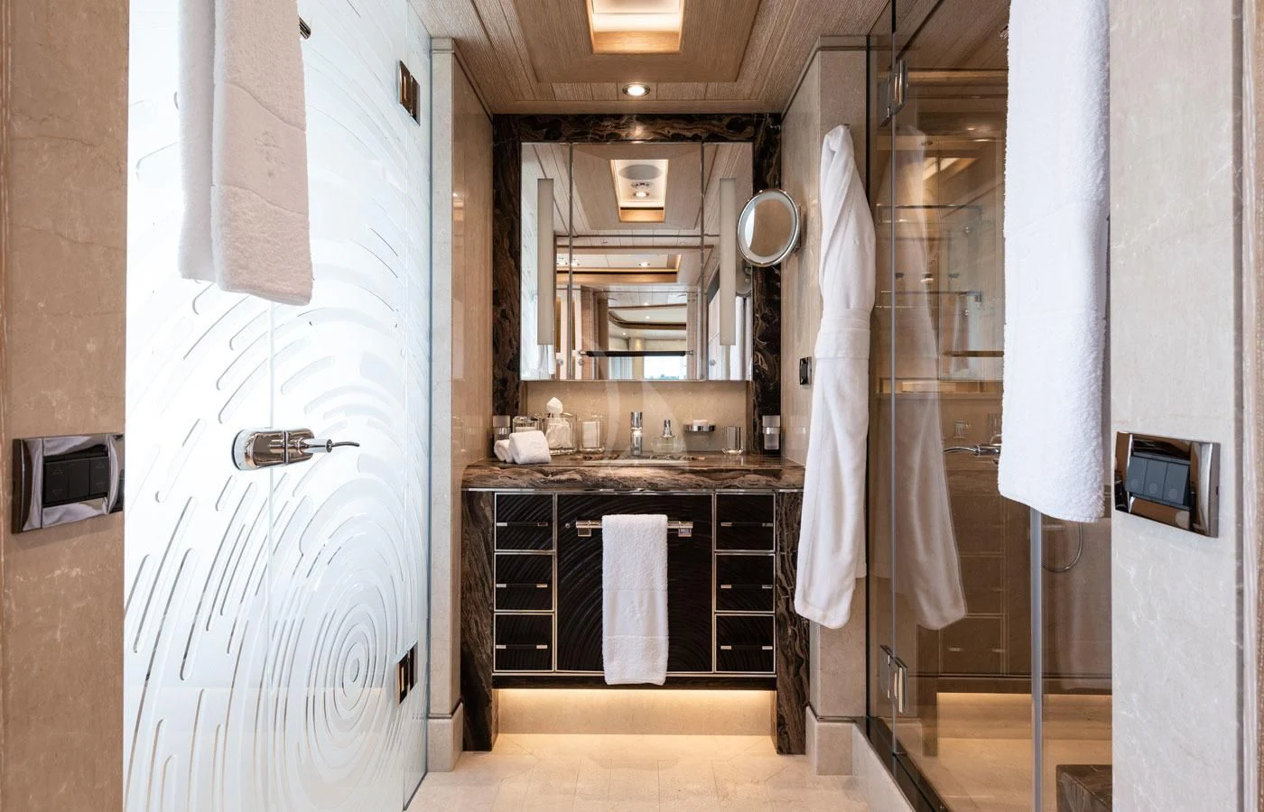 a bathroom with a sink and a mirror aboard STARBURST IV Yacht for Charter