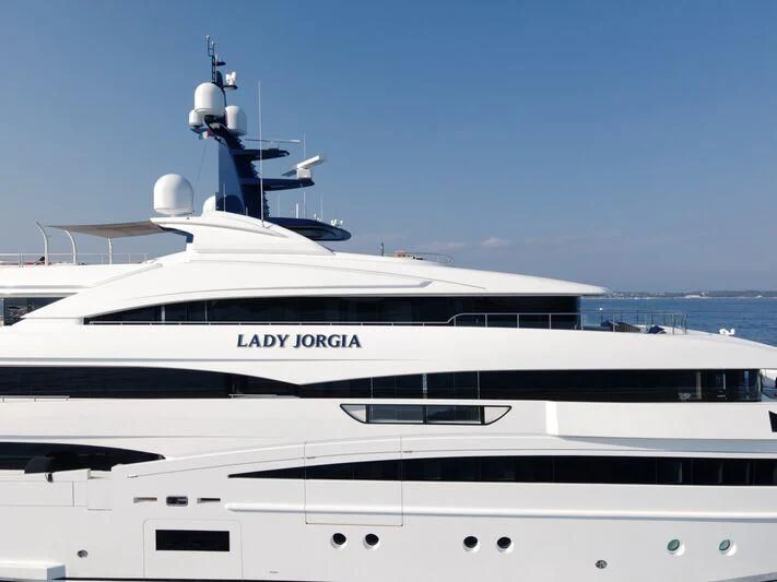 a white yacht with a wind turbine on top aboard STARBURST IV Yacht for Charter