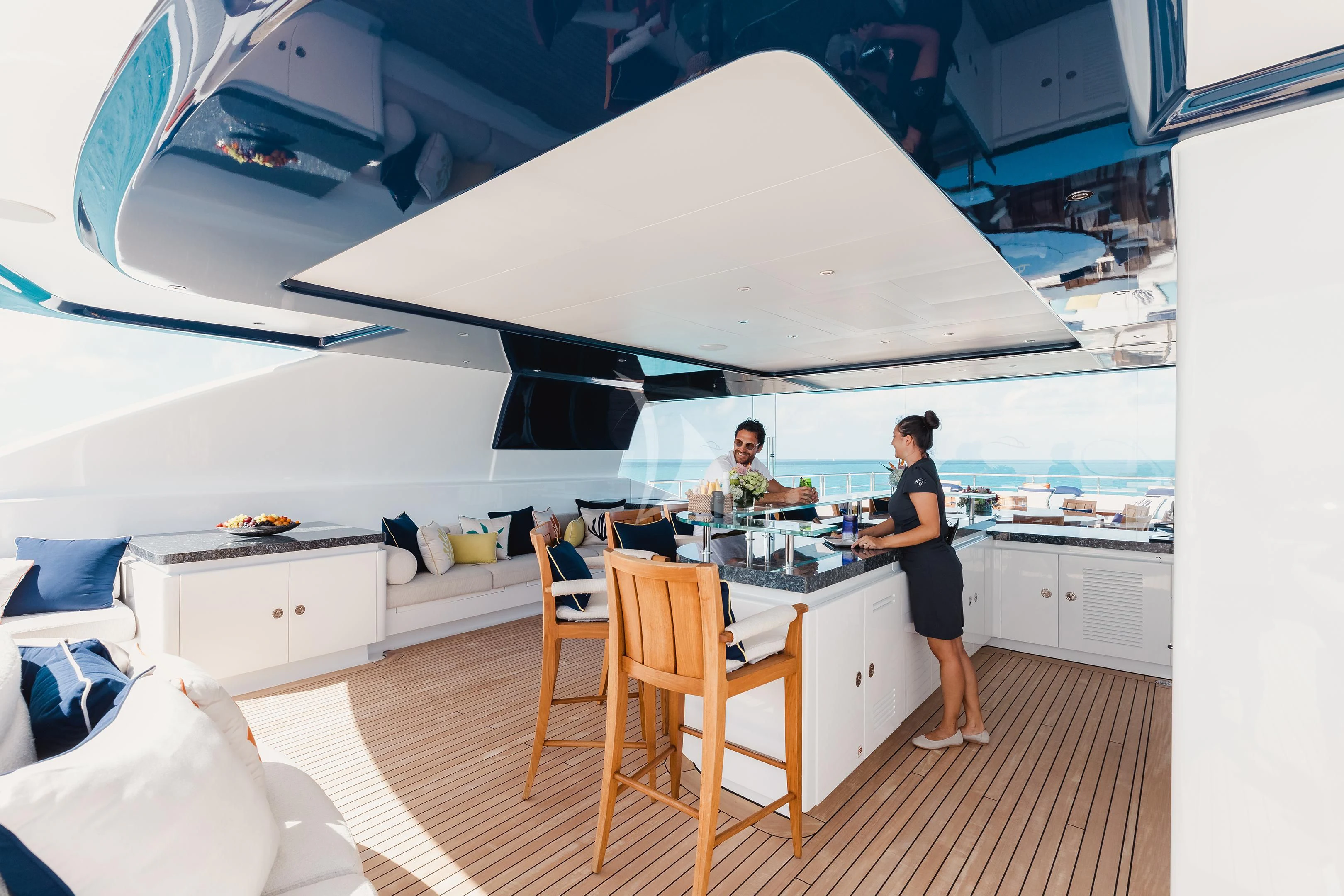 a couple of women in a kitchen aboard STARBURST IV Yacht for Charter