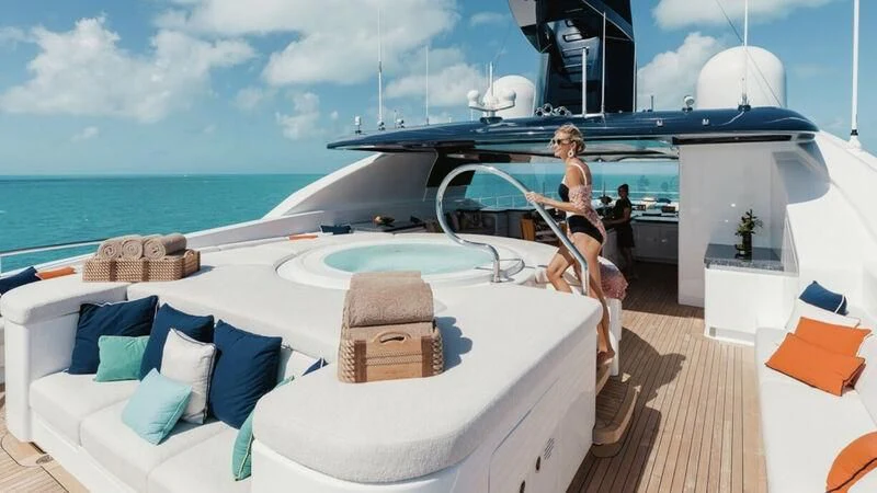 a person sitting on a boat aboard STARBURST IV Yacht for Charter