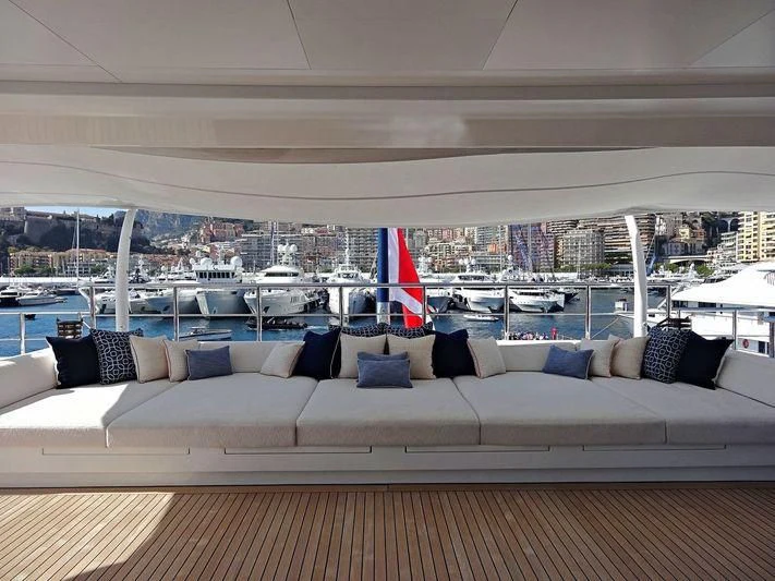 a couch with pillows on it aboard STARBURST IV Yacht for Charter