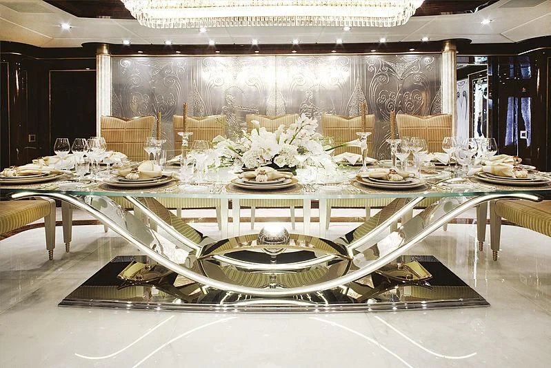a large room with a table set aboard DIAMONDS ARE FOREVER Yacht for Sale