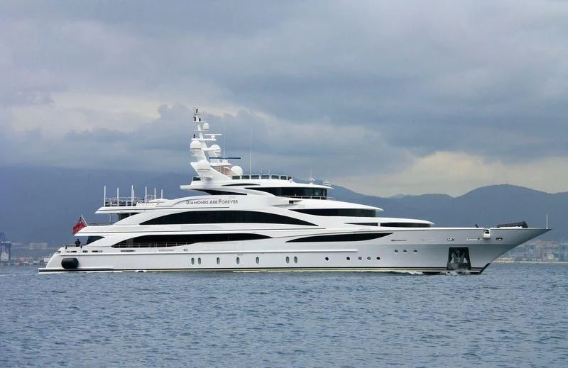a white yacht in the water aboard DIAMONDS ARE FOREVER Yacht for Sale