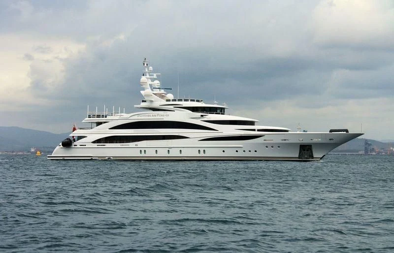 a white yacht in the water aboard DIAMONDS ARE FOREVER Yacht for Sale