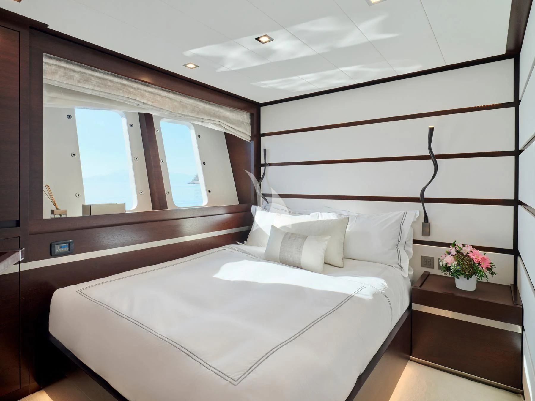 a bed in a room aboard HAKUNA MATATA Yacht for Charter