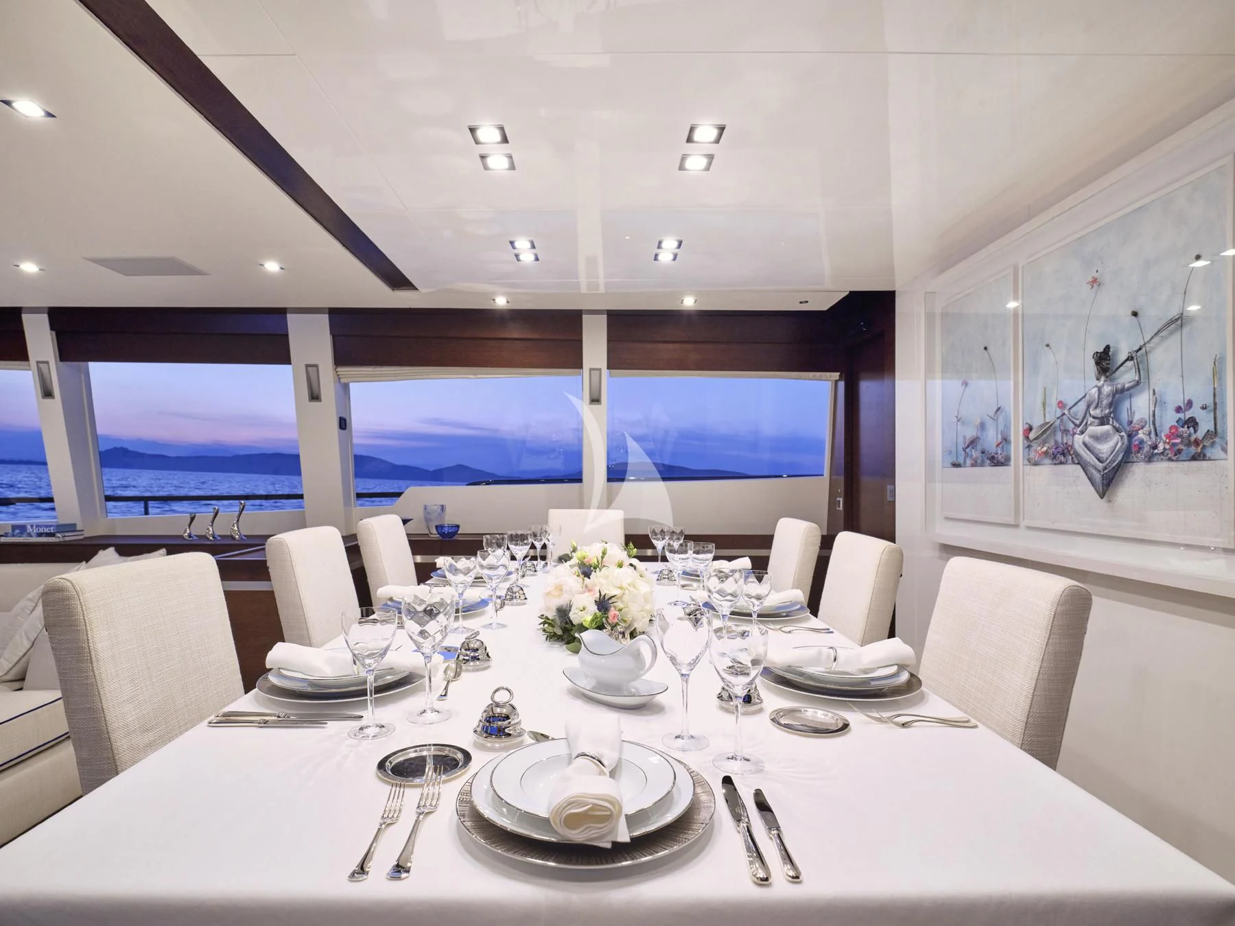 a table set for a dinner aboard HAKUNA MATATA Yacht for Charter