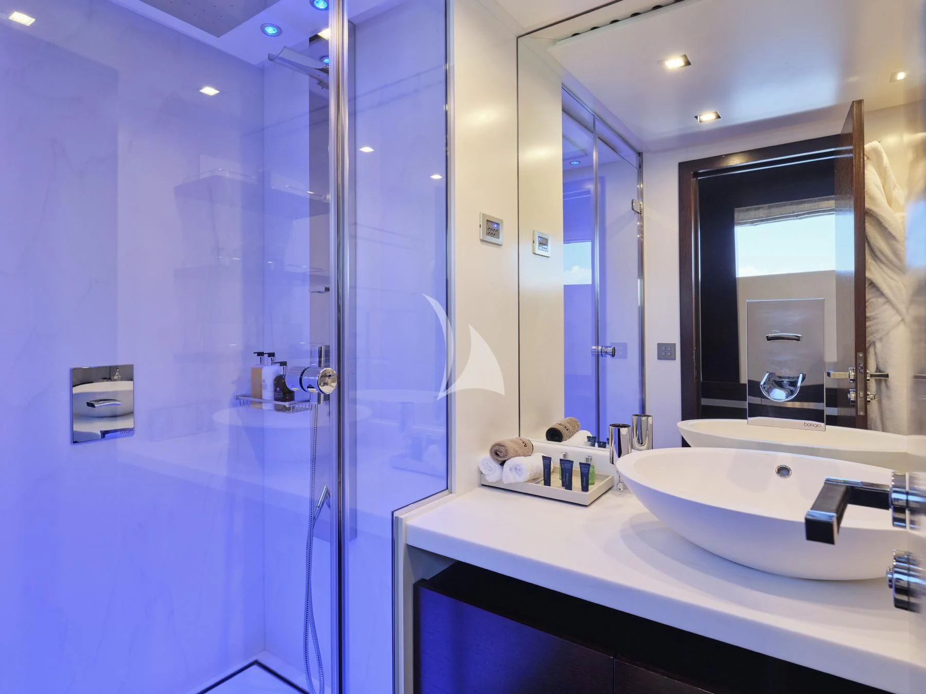 a bathroom with a shower and sink aboard HAKUNA MATATA Yacht for Charter