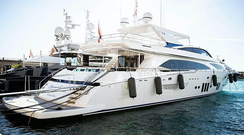 a large white boat in the water aboard HAKUNA MATATA Yacht for Charter