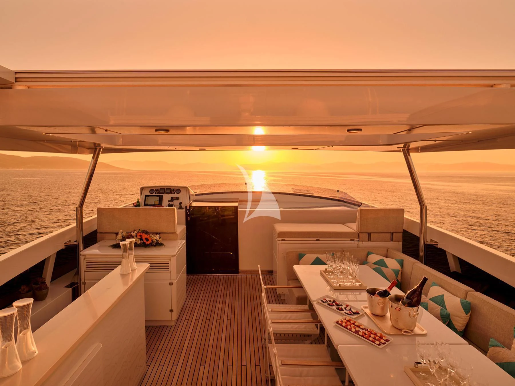 a balcony overlooking a body of water aboard HAKUNA MATATA Yacht for Charter