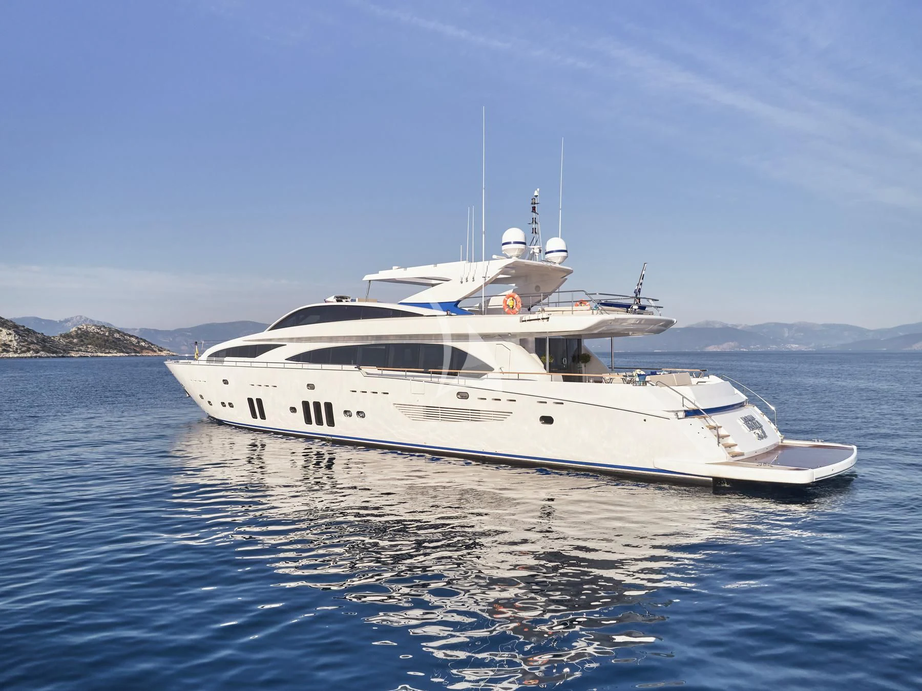 a white yacht in the water aboard HAKUNA MATATA Yacht for Charter