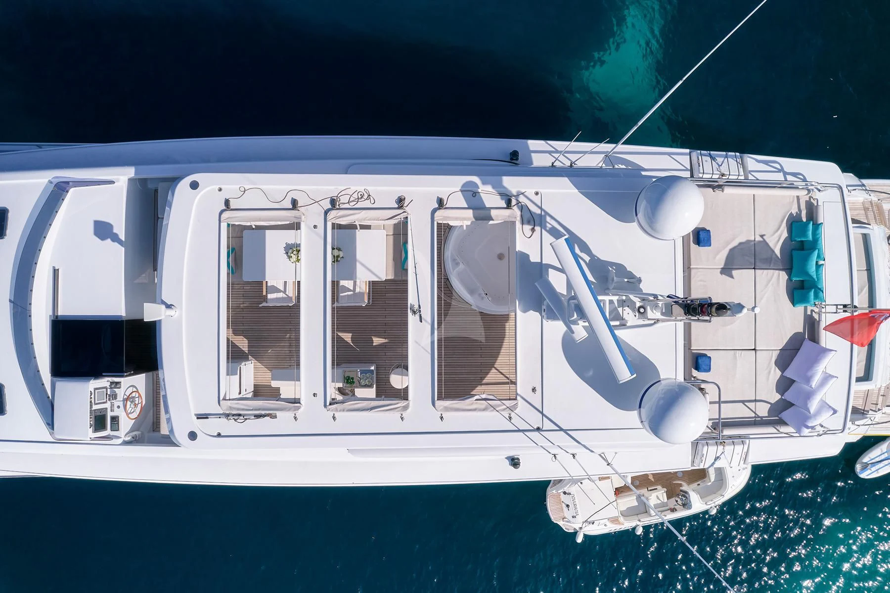 a white boat with a cartoon character on it aboard HAKUNA MATATA Yacht for Charter