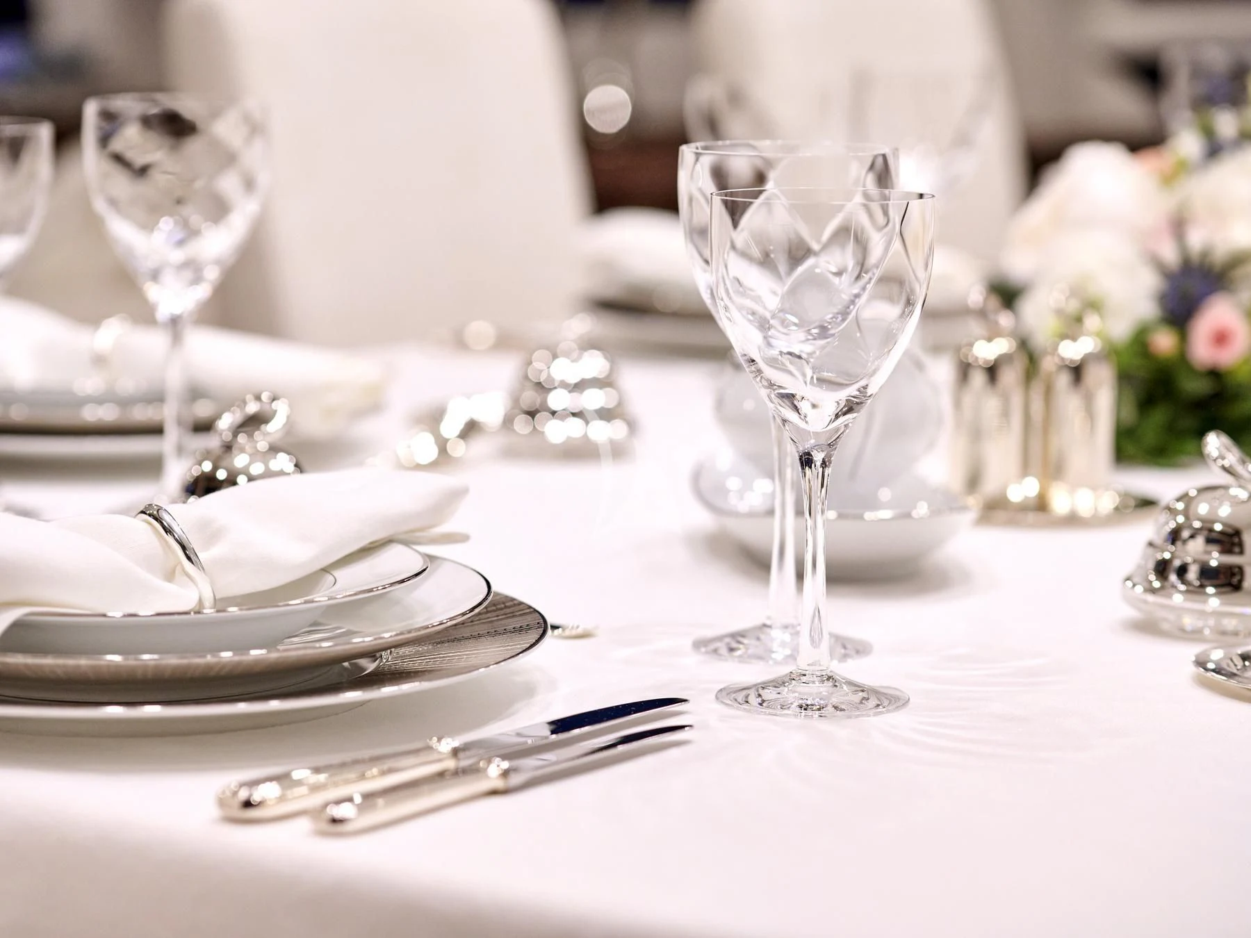 a set of glasses on a table aboard HAKUNA MATATA Yacht for Charter