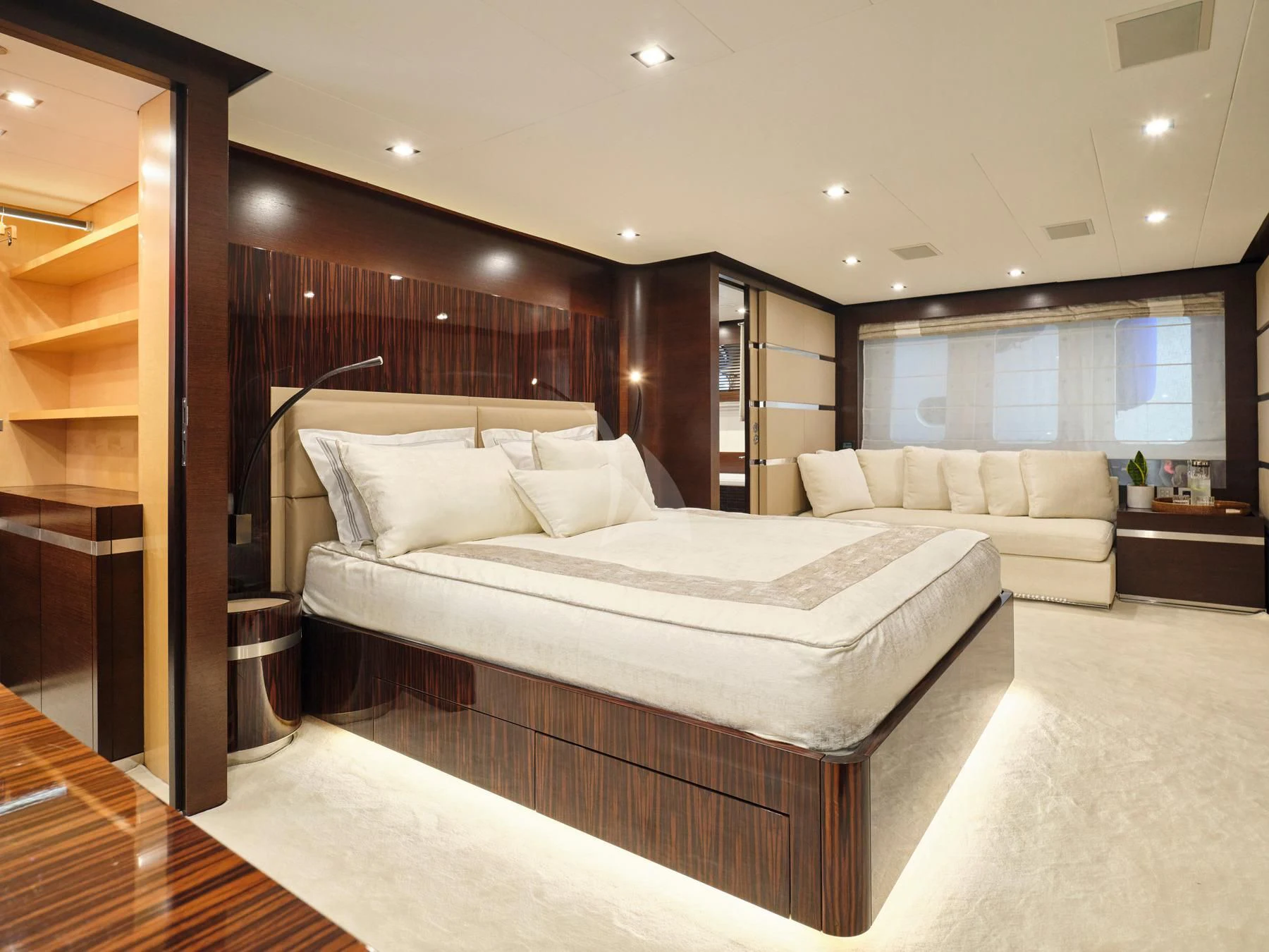 a large bedroom with a large bed aboard HAKUNA MATATA Yacht for Charter