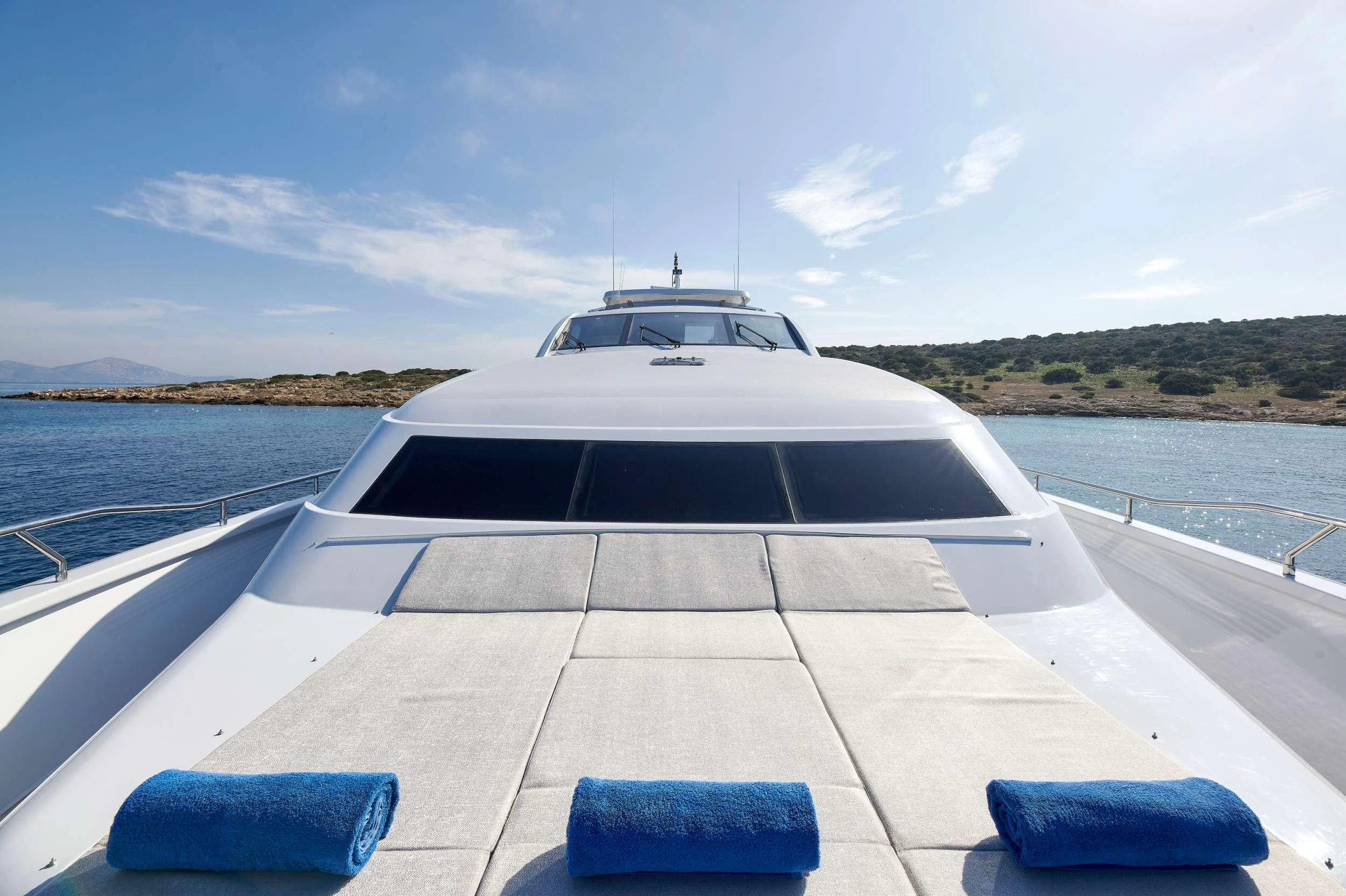 a boat on a body of water aboard HAKUNA MATATA Yacht for Charter