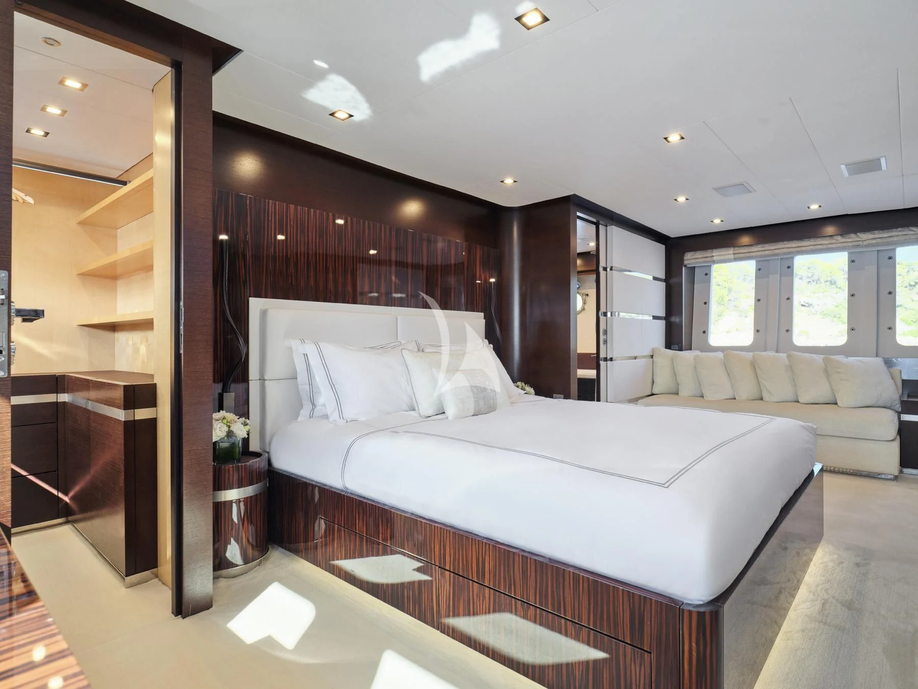 a large bedroom with a large bed aboard HAKUNA MATATA Yacht for Charter