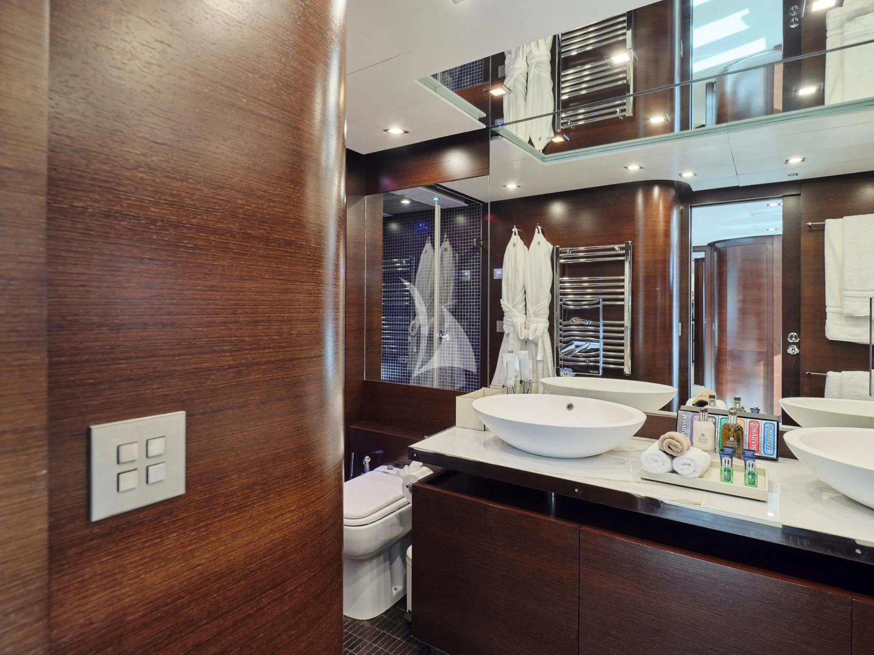 a bathroom with a sink and a toilet aboard HAKUNA MATATA Yacht for Charter