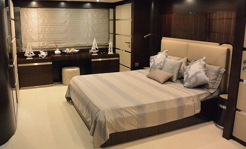 a bed in a room aboard HAKUNA MATATA Yacht for Charter