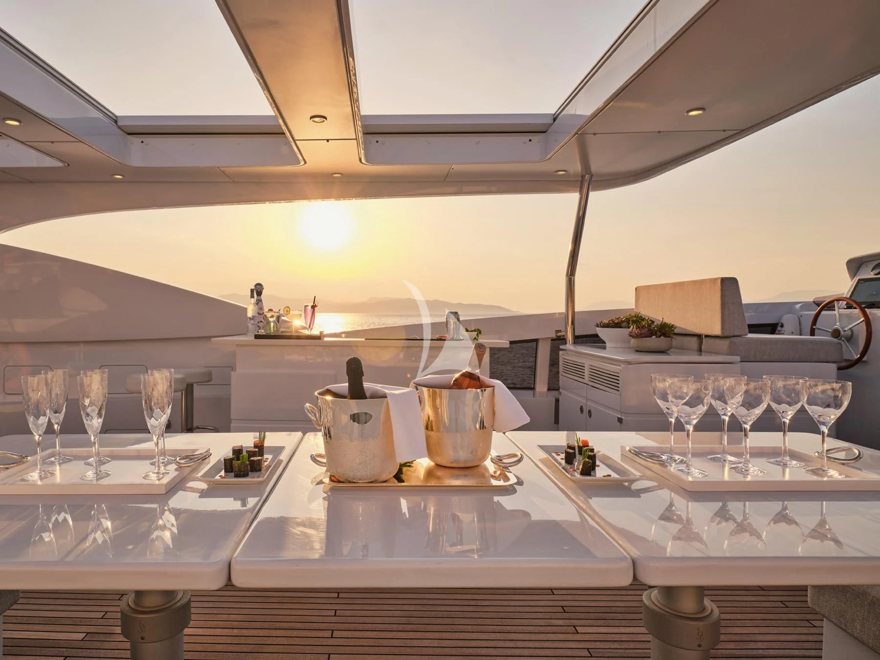 a kitchen with a large island aboard HAKUNA MATATA Yacht for Charter