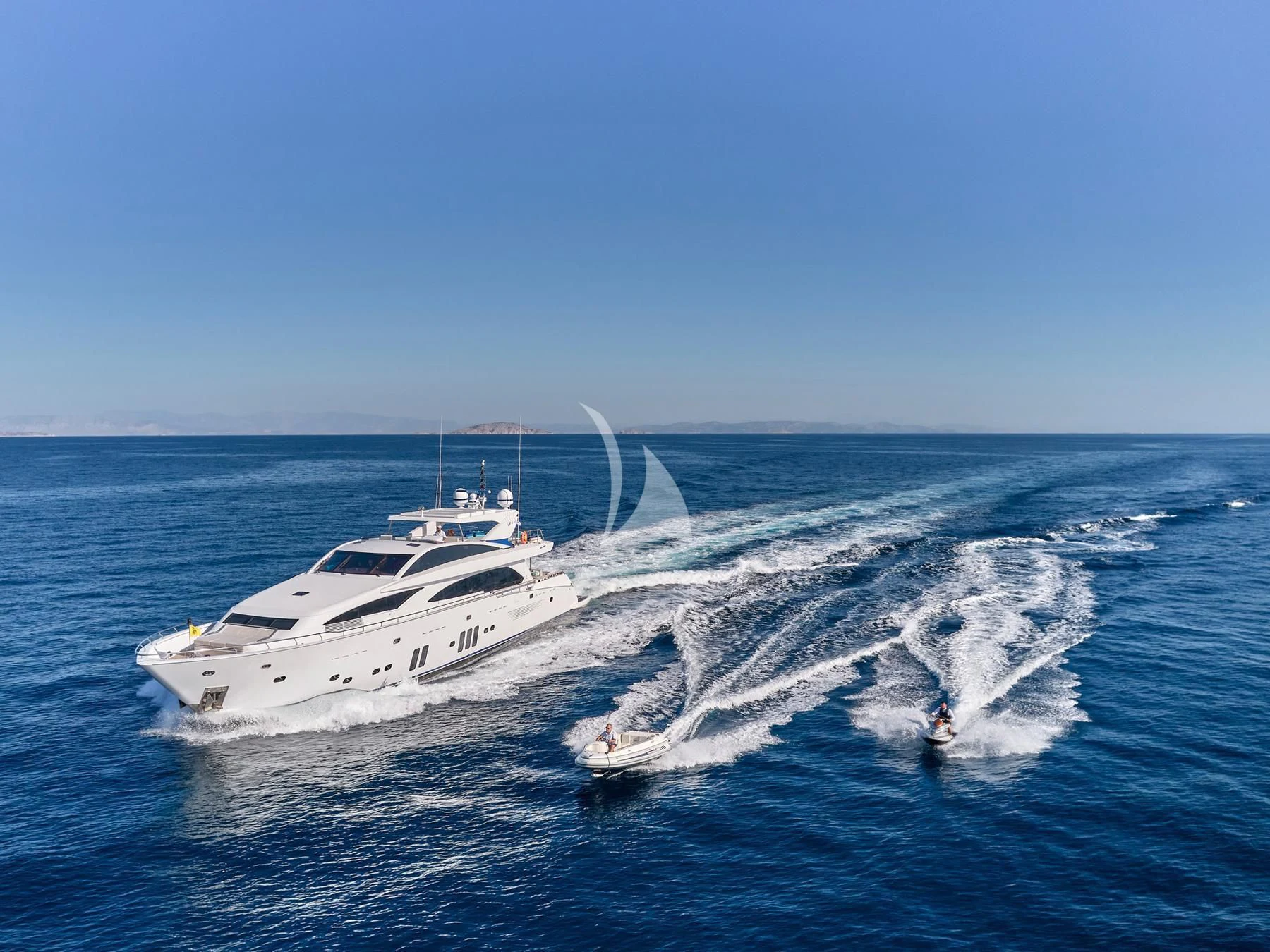 a white yacht in the water aboard HAKUNA MATATA Yacht for Charter