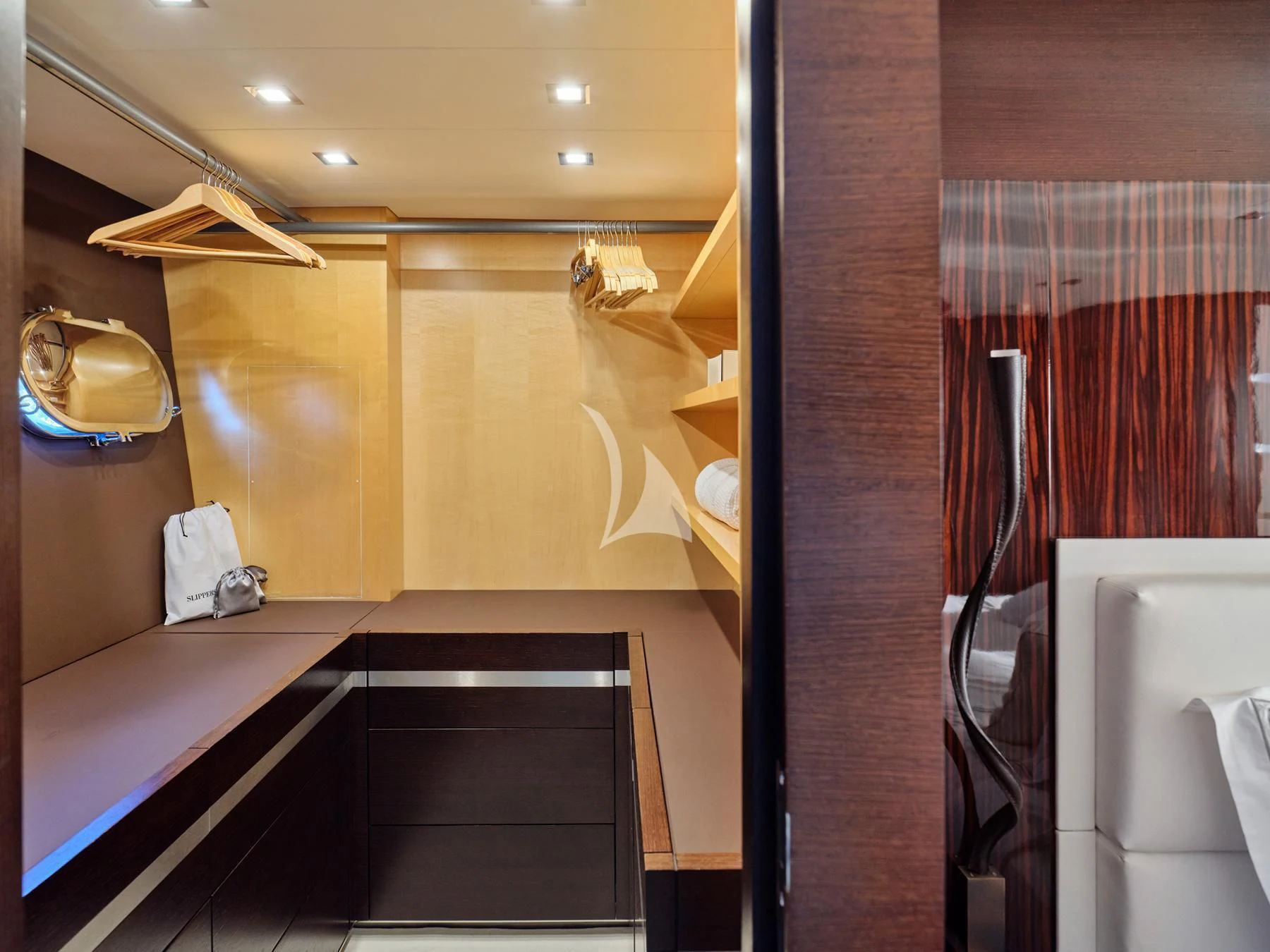 a bathroom with a sink and a mirror aboard HAKUNA MATATA Yacht for Charter