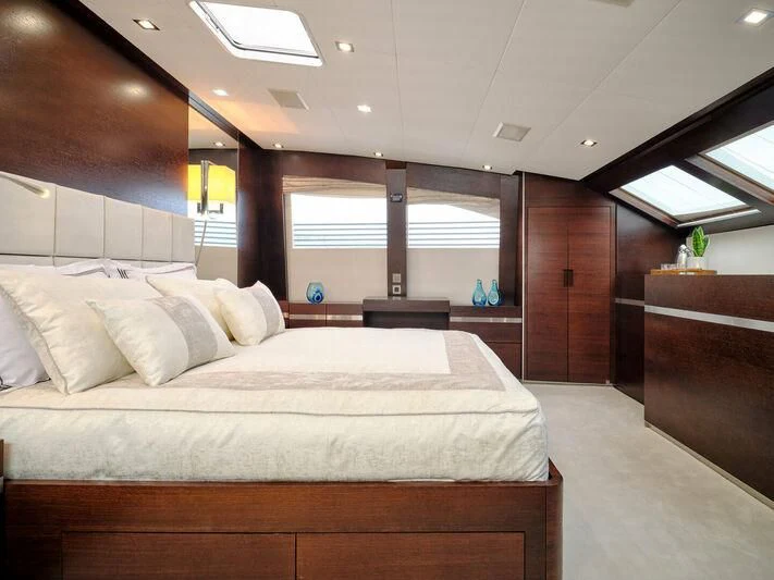 a large bed in a room aboard HAKUNA MATATA Yacht for Charter