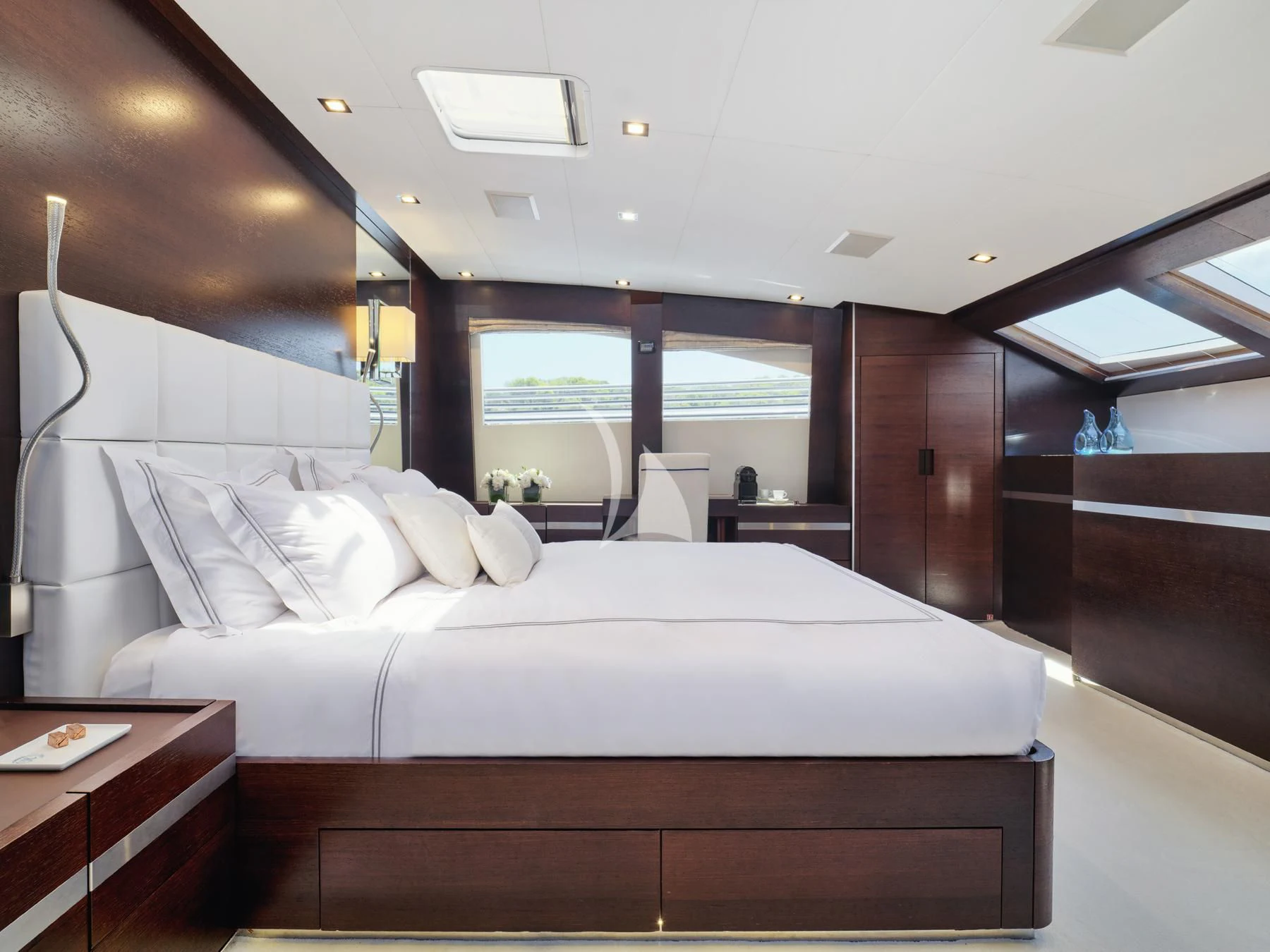 a bed in a room aboard HAKUNA MATATA Yacht for Charter