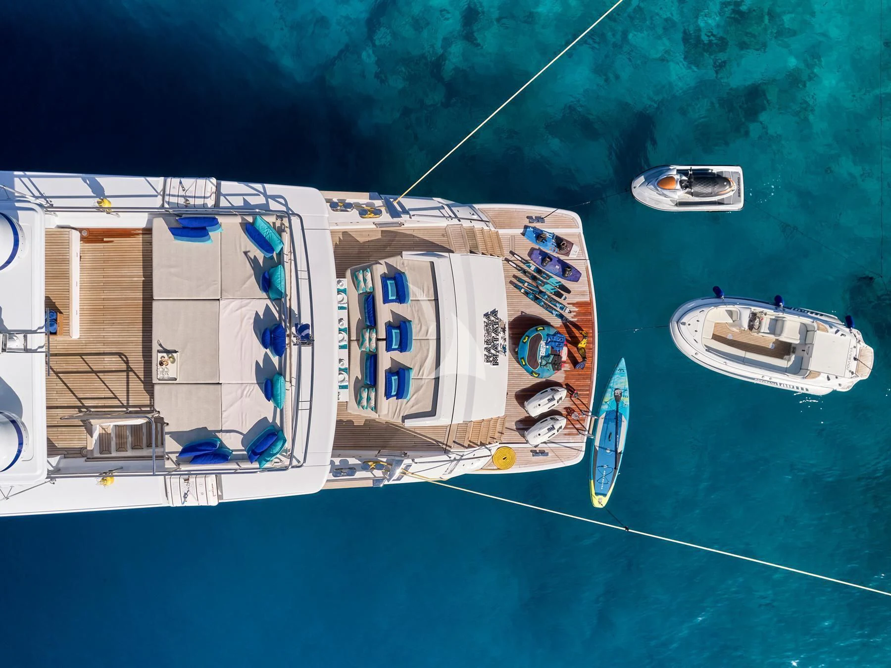 a group of boats on a body of water aboard HAKUNA MATATA Yacht for Charter