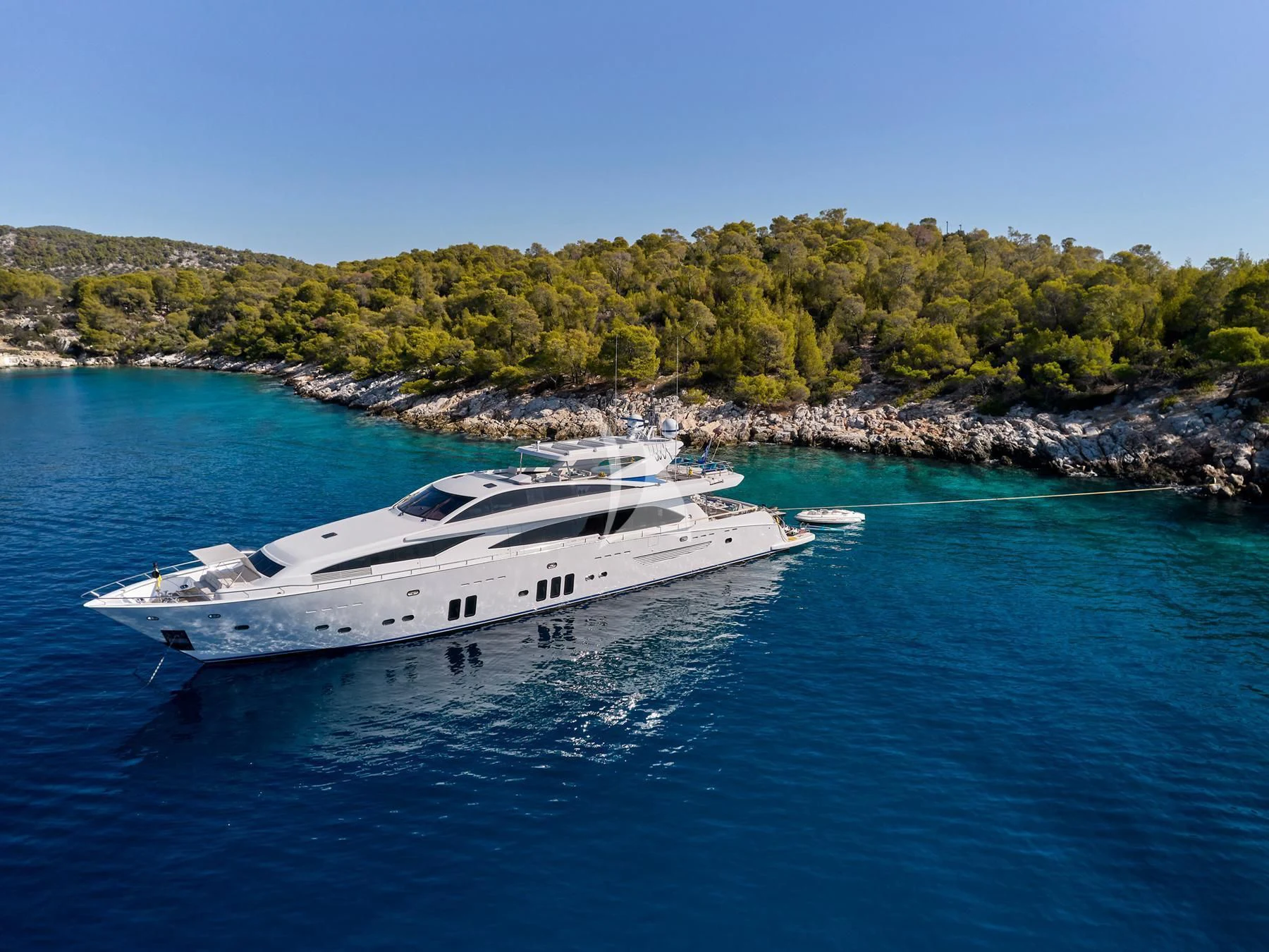 a white yacht in the water aboard HAKUNA MATATA Yacht for Charter