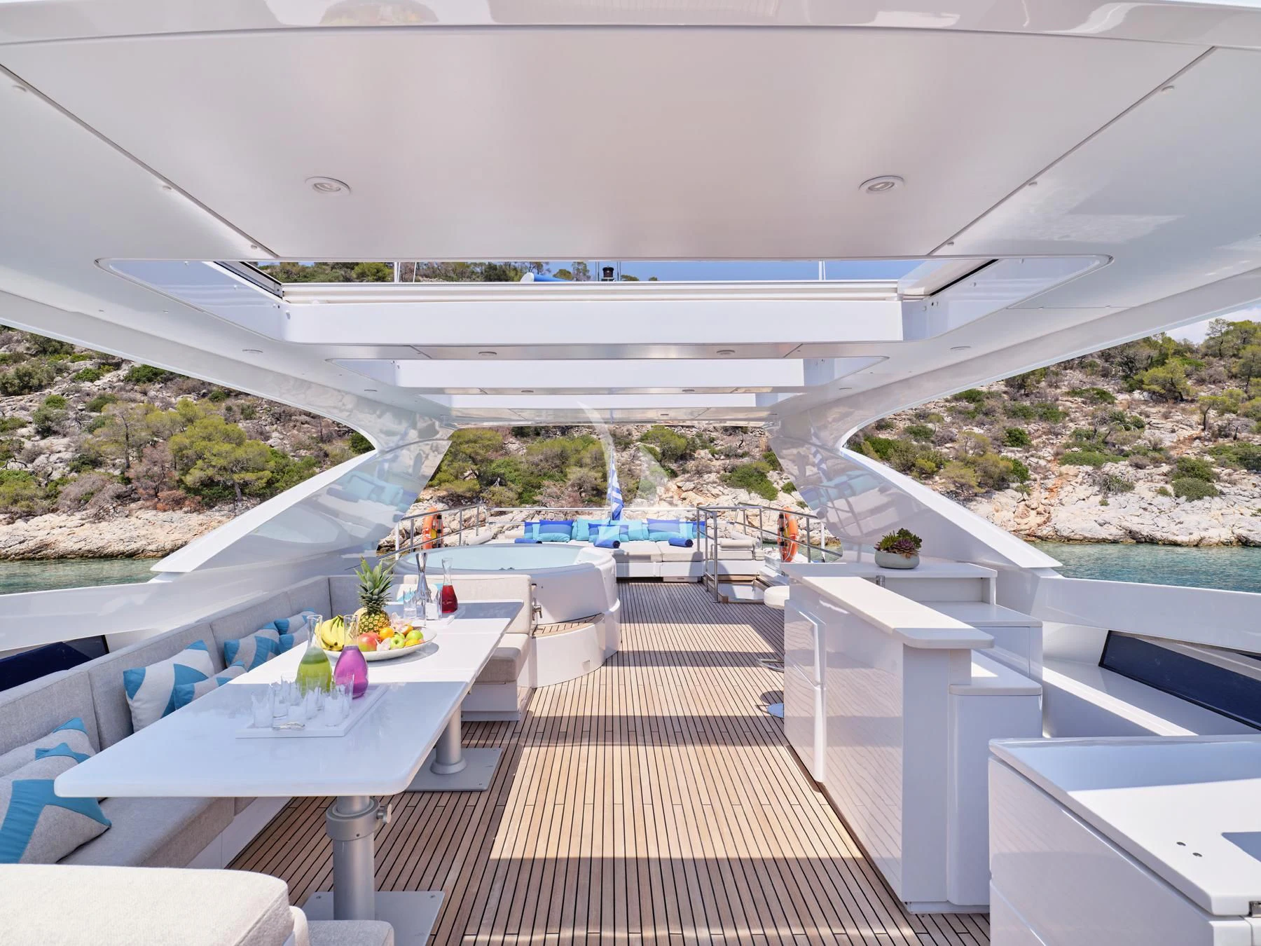 a room with a table and chairs aboard HAKUNA MATATA Yacht for Charter