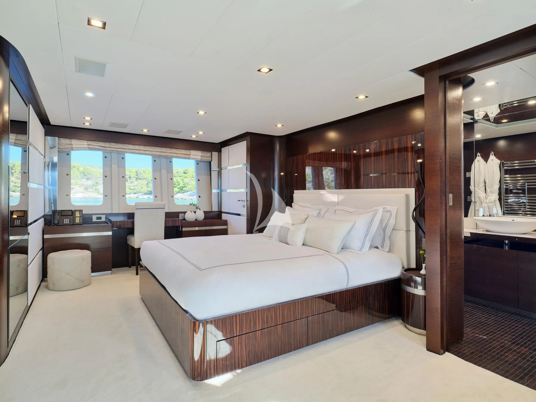 a large bedroom with a large bed aboard HAKUNA MATATA Yacht for Charter