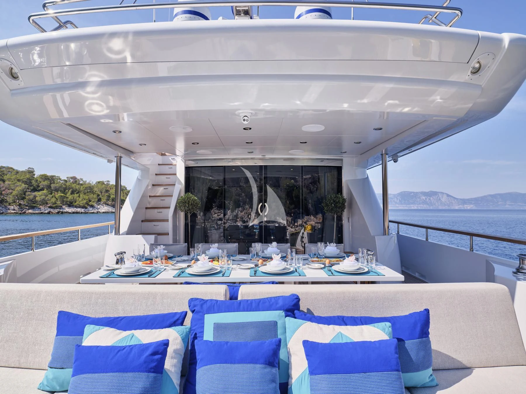 a room with a table and chairs aboard HAKUNA MATATA Yacht for Charter