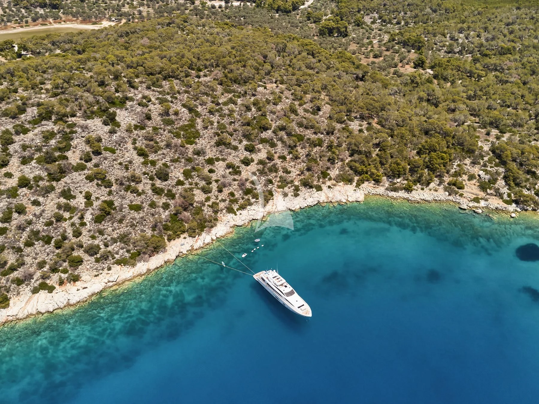 a surfboard on a wave aboard HAKUNA MATATA Yacht for Charter