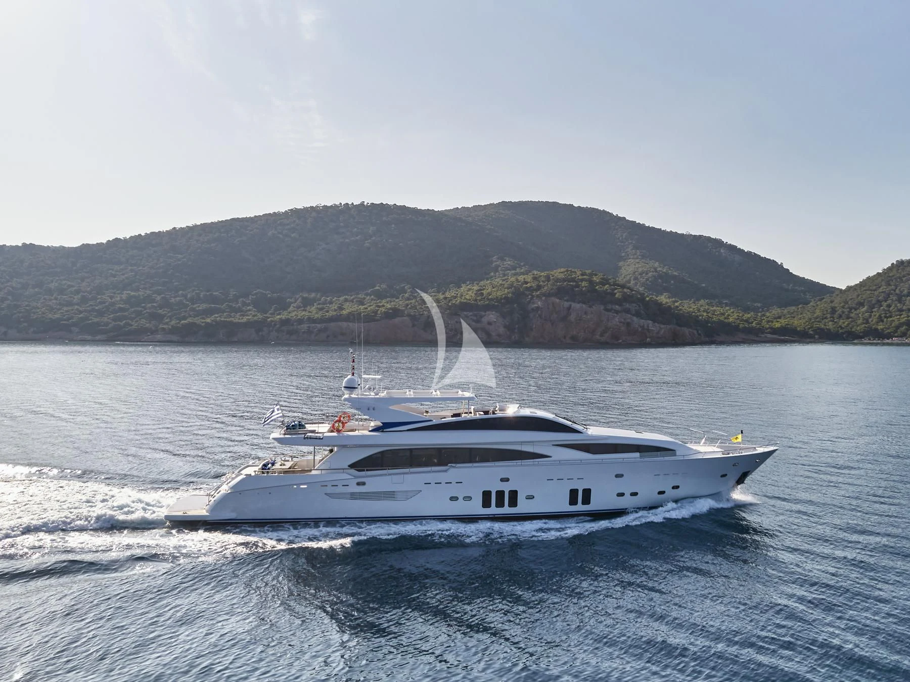 a white boat on the water aboard HAKUNA MATATA Yacht for Charter