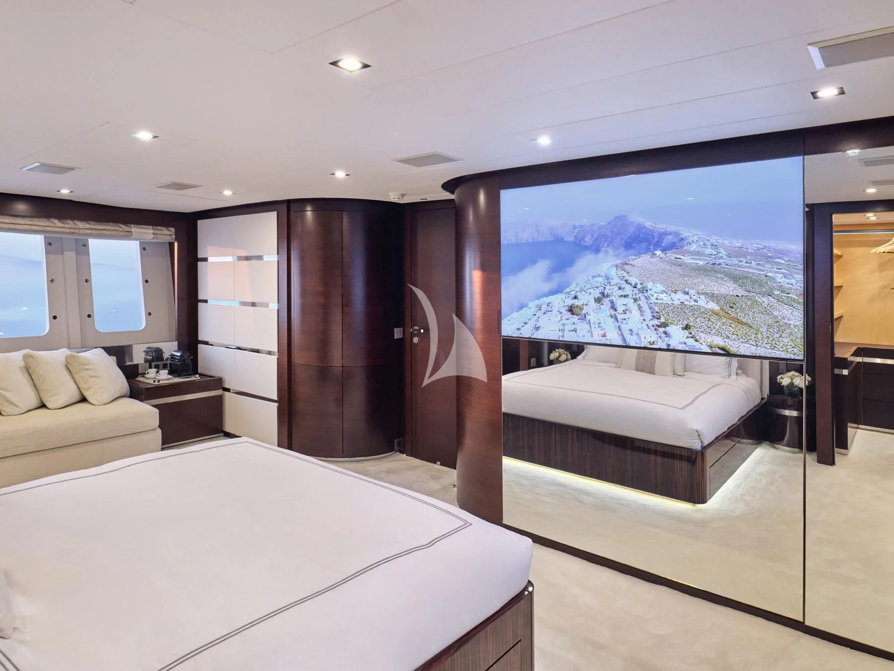 a room with a large window and a bed aboard HAKUNA MATATA Yacht for Charter